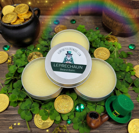Leprechaun beard balm with gold coins and shamrocks on a wooden surface