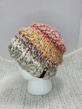 Women's "Rainbow Spice" Wool Blend Messy Bun Beanie | Hand Knitted Pony Tail Winter Hat | USA Made | Gray Pink Yellow Orange Multicolor